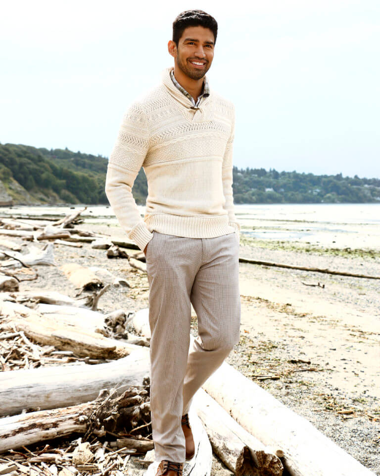 Christian Lopez on beach dressed business casual
