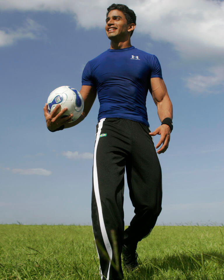 Christian Lopez holding a soccer ball