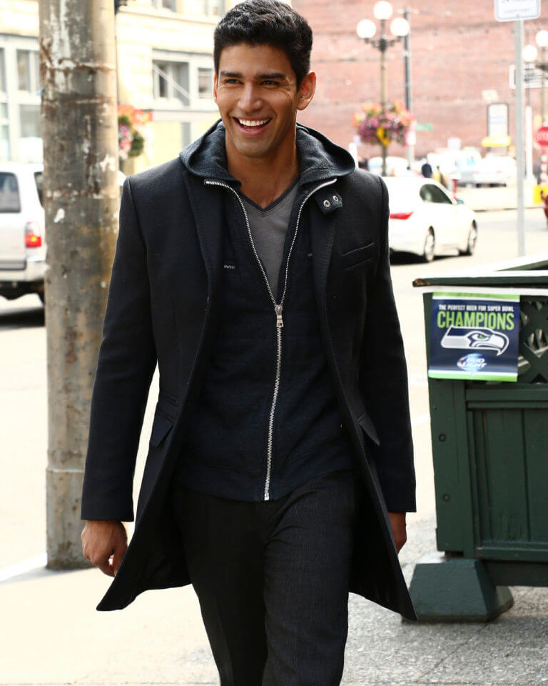 Christian Lopez walking and smiling