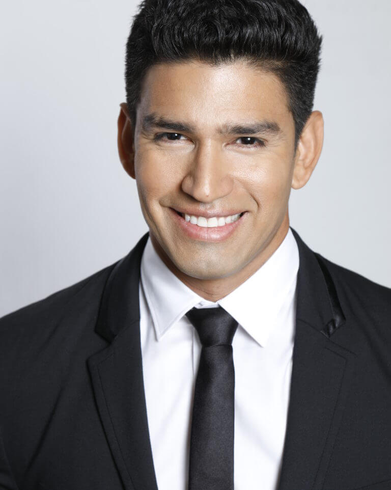 Christian Lopez in business suit