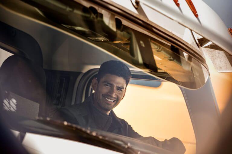 Christian Lopez Penske smiling inside truck